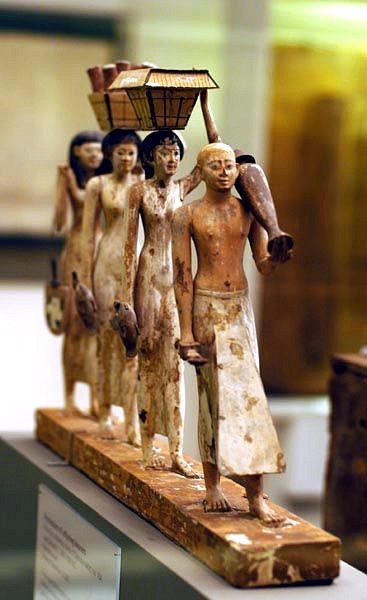 Painted wood offering bearers from the tomb (10A) of Djehuty-Nakht at Deir el-Bersha dating to the late 11th Dynasty